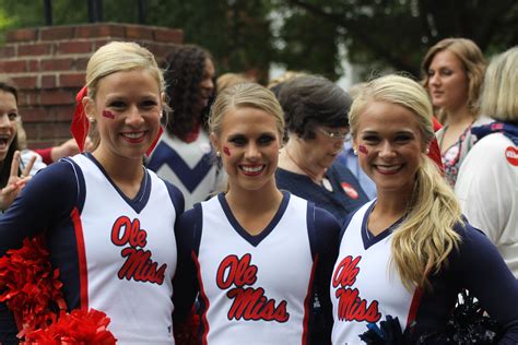 Cheerleaders in the Grove at Ole Miss in Oxford, MS | Ole miss, Football cheerleaders, College ...