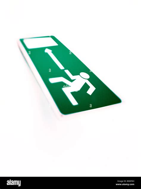 green exit sign on white background Stock Photo - Alamy