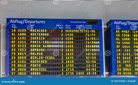 Airport Flight Information Displayed on Departure Board, Flight Status Changing. Flight Schedule ...