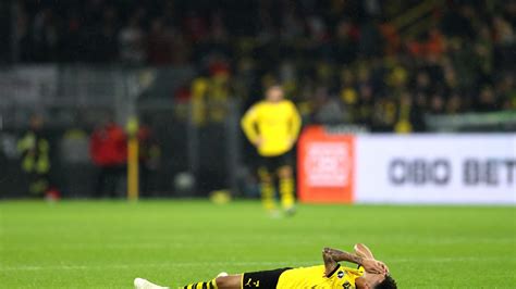 Borussia Dortmund star Jadon Sancho suffers injury scare after scoring ...