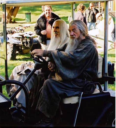 ⁣Sir Christopher Lee and Sir Ian McKellen driving a golf cart on set of ...