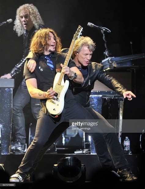 Phil X and Jon Bon Jovi of Bon Jovi perform on the 'This House Is Not For Sale Tour' at SAP ...