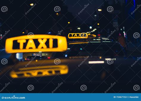 Taxi Sign at Night , Taxi Cars Stock Image - Image of illumination, symbol: 72467153