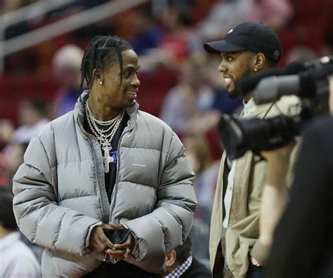 Travis Scott on the field for Texans-Colts playoff game