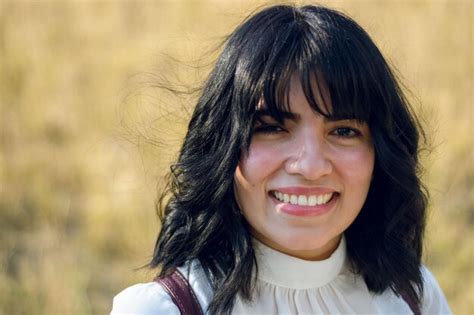 Premium Photo | Young latin woman of venezuelan ethnicity smiling with ...