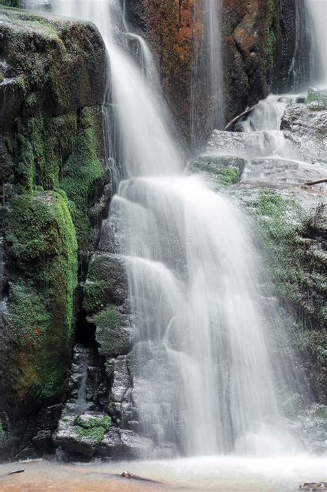 Close Up of Waterfall Cascade Over the Mossy Rock Stock Image - Image of green, nature: 148454873