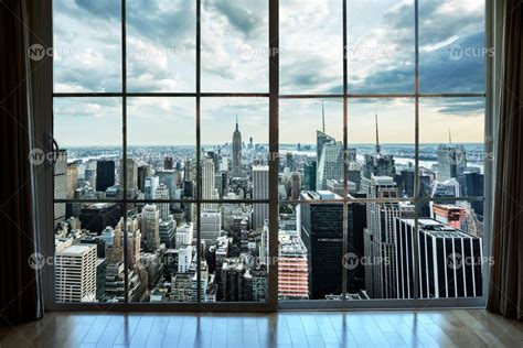 Manhattan cityscape view from high-rise window with curtains in luxury ...