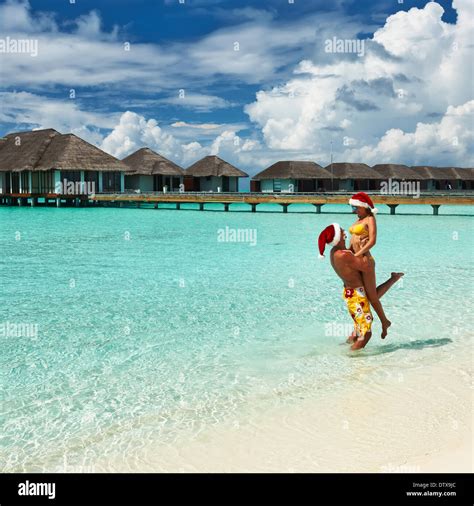 Couple on a beach at Maldives Stock Photo - Alamy