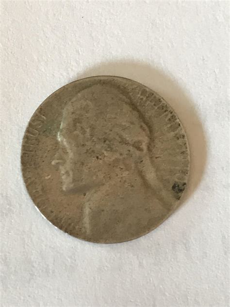 I found this in a coin roll and I do not know if it is an error. The ...