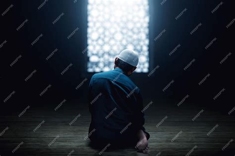 Premium Photo | Muslim man praying in the mosque