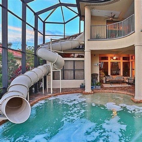 24 Awesome Home Indoor Pool Design With Slide To Make Your Kids Have ...