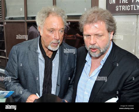 Tom Jones and his son Mark Woodward outside the BBC Radio One studios London, England - 27.07.10 ...