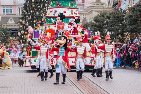 Disney Christmas Parade in Disneyland Paris. – Stock Editorial Photo © bukki88 #73913591