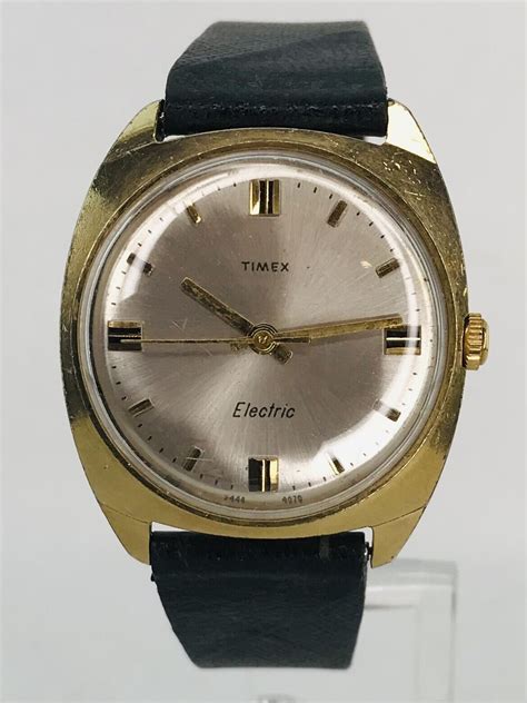 Mavin | Vintage Timex Electric Watch - Gold Tone - Silver Dial ...