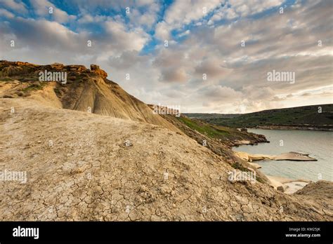 Sunset at Gnejna Bay on the west coast of Malta Stock Photo - Alamy