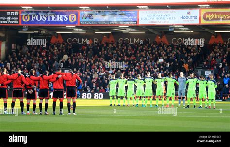 The two team's stand for a minute's silence for the Colombia plane crash victims before the ...