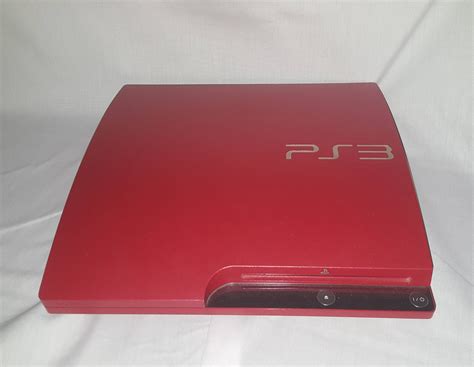 My Scarlet Red PS3 Slim from the UK. Living in the US I was amazed to ...