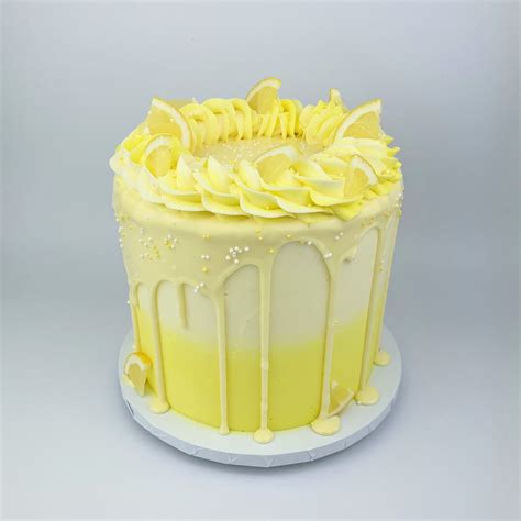 Lemon Drip Cake | Lemon birthday cakes, Chocolate drip cake, Drip cakes