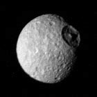 File:Voyager 1 - view of Saturn's moon Mimas.jpg - Wikimedia Commons