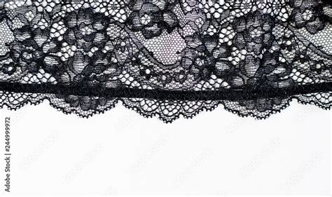 Black lace texture with flowers on a white background.Background of ...