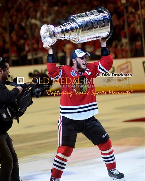 JONATHAN TOEWS holds up the Stanley Cup "THE JOY OF VICTORY! " - Gold Medal Impressions