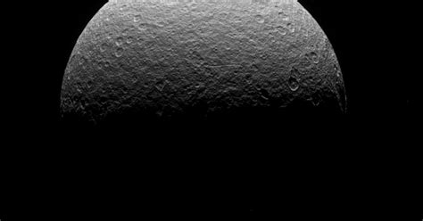 Saturn's moon Rhea has a mysterious material on its surface