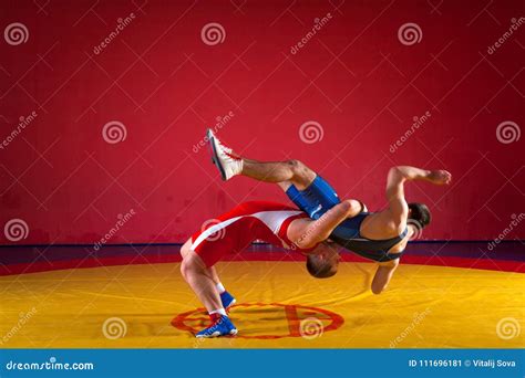 Two strong wrestlers stock image. Image of background - 111696181