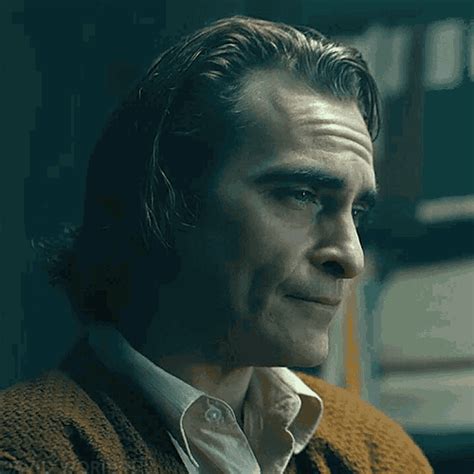 Joaquin Phoenix Laughing GIF - JoaquinPhoenix Laughing Pain - Discover & Share GIFs