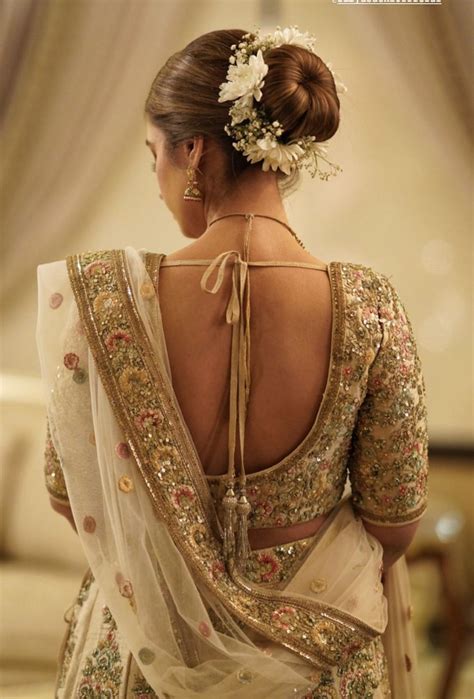 Pin by ArtCollector on Indian designers | Bridal bun, Pakistani bridal hairstyles, Indian bridal ...