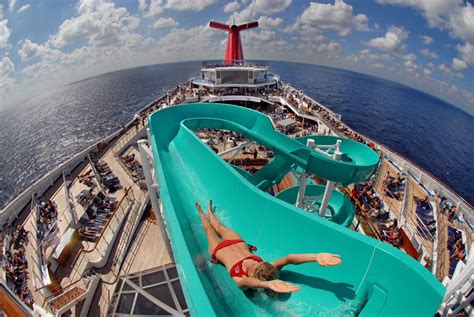 Freedom to slide: A girl takes off from the top of the wickedly fun slide on the Lido deck of ...