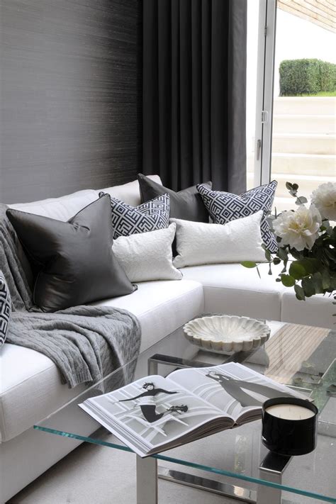 This corner sofa is adorned beautifully with scatter cushions ...