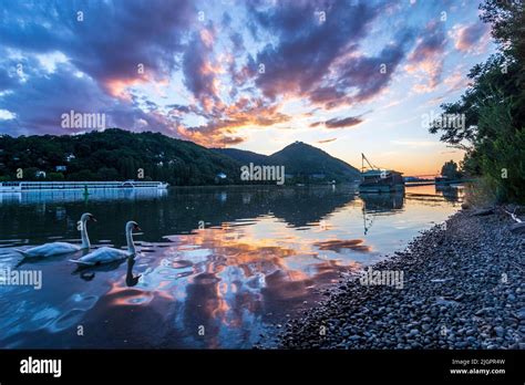 Wien, Vienna: sunset at river Donau (Danube), view to mountain ...