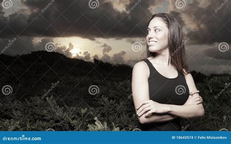 Woman Smiling in a Nature Setting Stock Photo - Image of sand, cloudy: 10643574