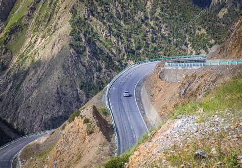 The rugged mountain road. — Stock Photo © Liuzishan #122007638