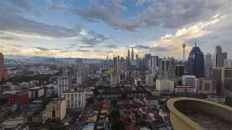 4K Time lapse: Dramatic city view during monsoon tropical season with ...