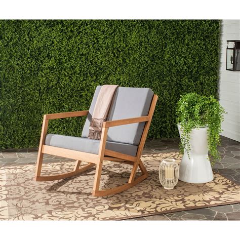 Contemporary with a nod to hand-crafted Shaker individuality, this elegant outdoor rocking chair ...