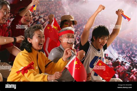 crowd cheering in stadium Stock Photo - Alamy