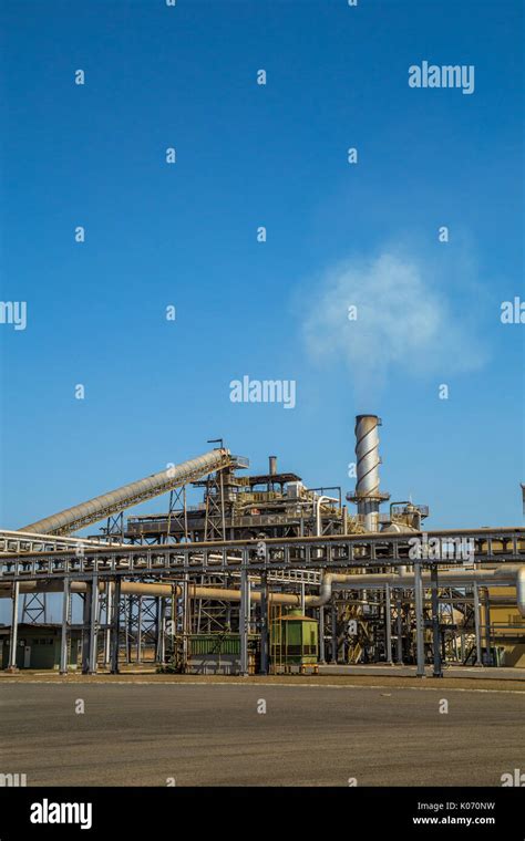 sugar cane industry factory production alcohol Stock Photo - Alamy