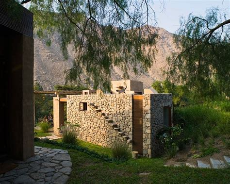 marina vella arquitectos uses stone and adobe to build chontay house in peru