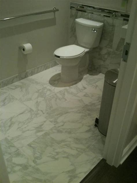 9x18 Calacatta marble tile bathroom restroom installation Tampa, florida