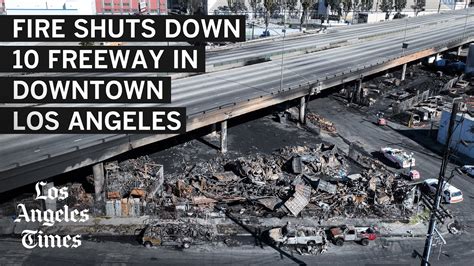 Fire under 10 Freeway in downtown L.A. upends traffic with no reopening in sight - YouTube