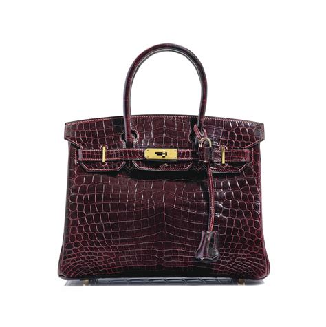 A BURGUNDY CROCODILE BIRKIN BAG , HERMÈS, 2004 | Christie's