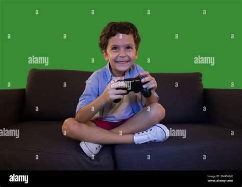 Boy playing video games Stock Photo - Alamy