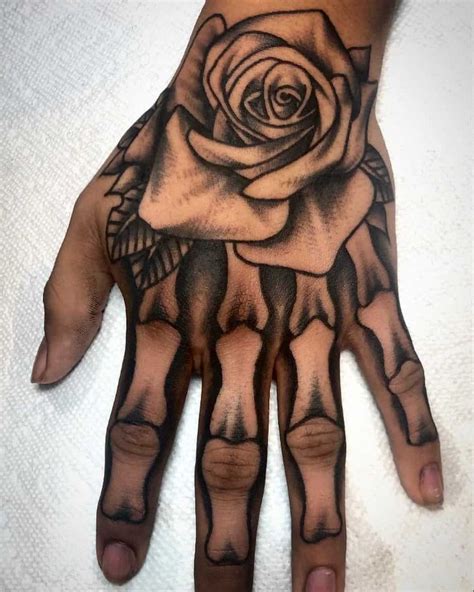 60+ Skeleton Hand Tattoo Ideas (and The Symbolism behind Them) | Skull ...