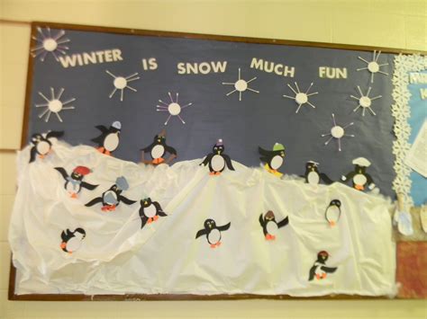 Playful penguin bulletin board. Snowflakes are made from cotton swabs & make-up pads. Penguins ...