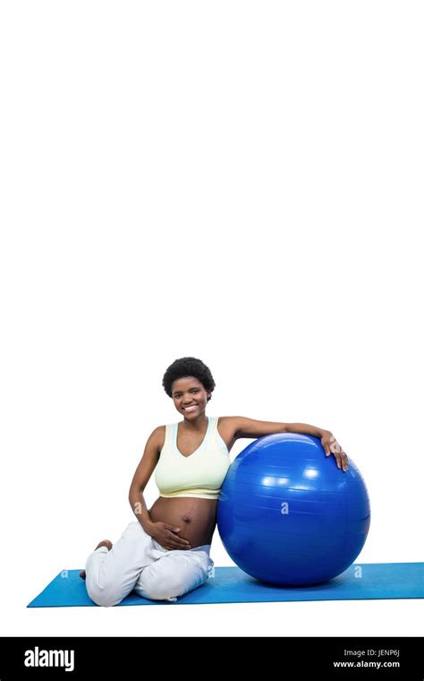 Pregnant woman with exercise ball Stock Photo - Alamy