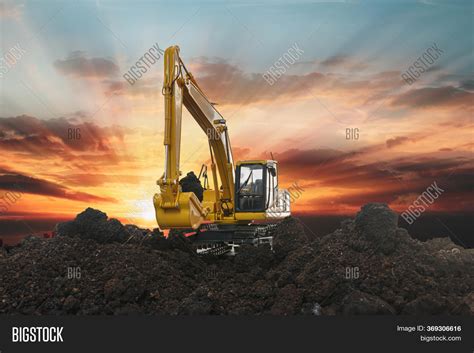 Excavators Digging Image & Photo (Free Trial) | Bigstock