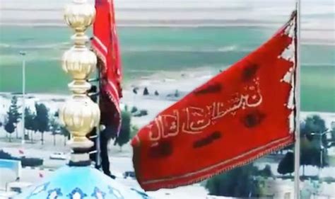 WATCH Terrifying moment Iran unveils red flag at Mosque warning of ...