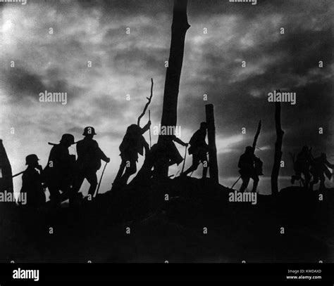 World War 1. Silhouette of German soldiers against a bombed out battlefield. Ca. 1916-18. (BSLOC ...