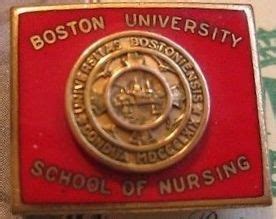 a red and gold boston university school of nursing pin